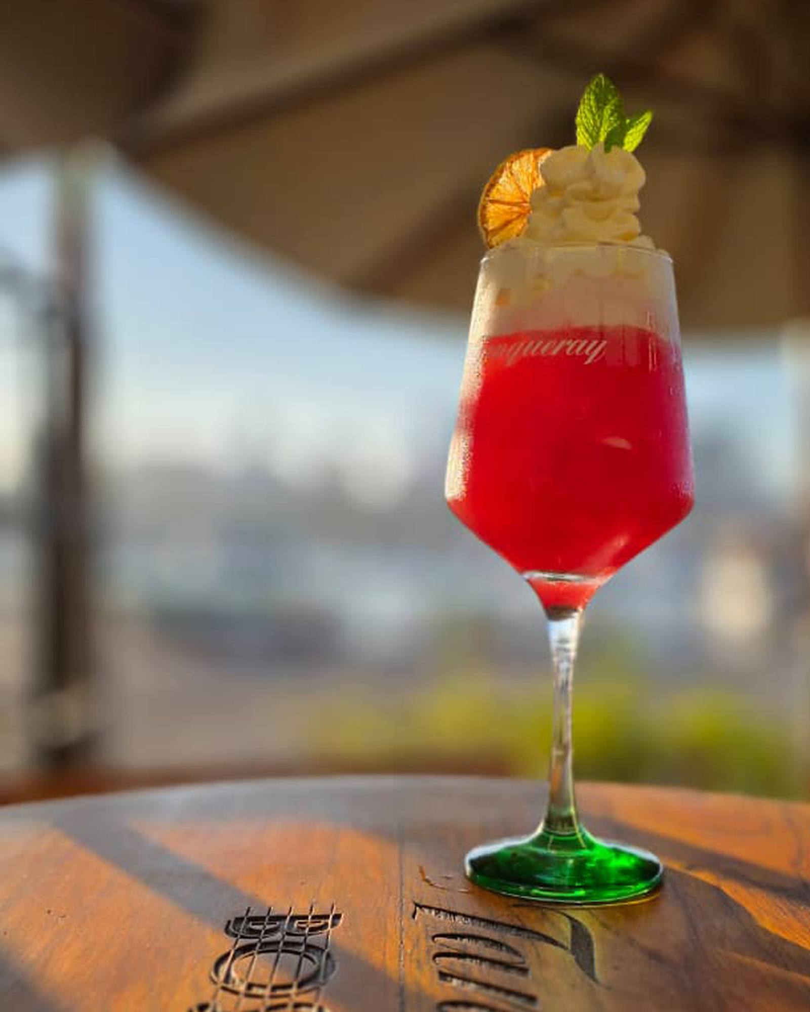 Signature drink served overlooking the marina